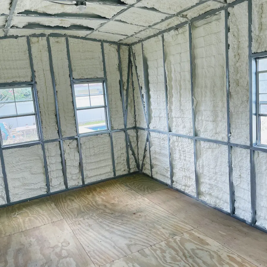 Closed-cell spray foam insulation applied to wall cavities in a residential project in Vernal